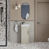 Modern bathroom with terrazzo flooring, shower, sink, and toilet.