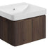 Textured walnut wall hung basin unit. Bathroom vanity unit with white ceramic sink on a white background