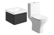 Bathroom setup with a black wall-mounted cabinet and a white toilet on a white background