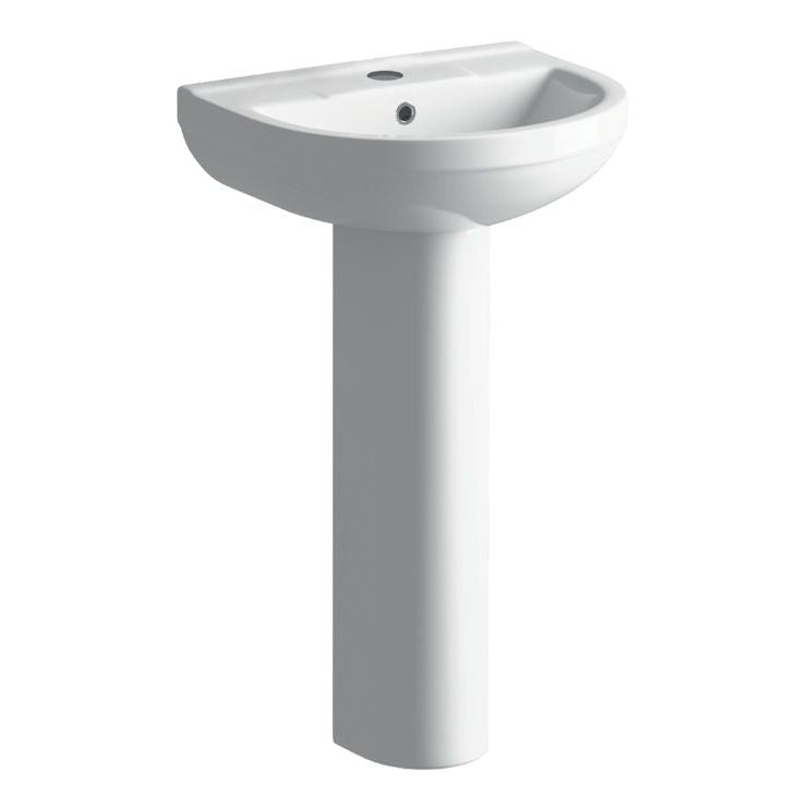 White pedestal sink on a white background