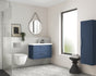 Modern bathroom vanity unit with blue vanity unit, mirror, and window.