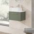 Wall-mounted bathroom vanity with a sink and cabinet in a modern bathroom setting.