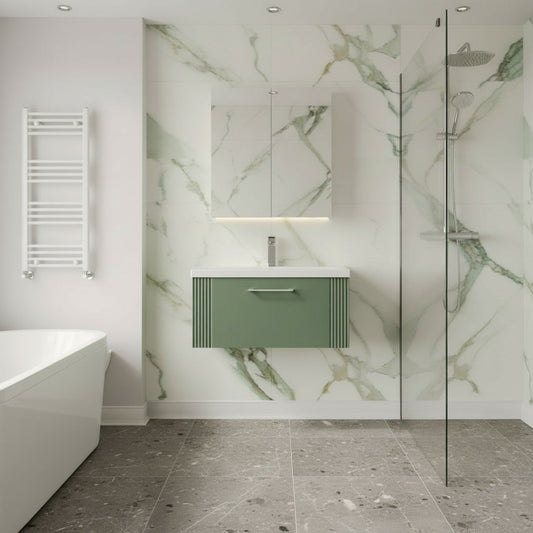 Modern bathroom with green marble wall, sink, and glass shower enclosure.
