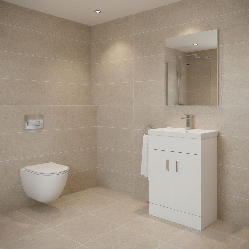 Modern bathroom with beige tiled walls, a white toilet, and a white vanity unit with mirror.