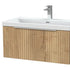 Bathroom vanity with wooden finish and white countertop on a white background