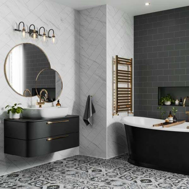 Modern bathroom with black vanity, white bathtub, and decorative elements. Multipanel Levanto Marble Herringbone Tile Effect Wet Wall Shower Panel
