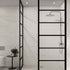 Modern bathroom with a shower enclosure and small table with plant Multipanel Levanto Marble Tile Effect Wet Wall Shower Panel