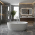 Modern bathroom with a freestanding bathtub, vanity, and shower area.