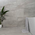 Astra grey matte stone-effect tiles, 1200x600mm, ideal for both floors and walls, crafted from porcelain, featuring perfect grey tones.