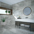Astra Grey Matt Stone Effect Tiles, 1200x600mm, suitable for floors and walls, made of porcelain, featuring a sleek grey finish. 