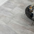 Astra grey matte stone-effect tiles, 1200x600mm, ideal for both floors and walls, crafted from porcelain, showcasing perfect grey tones.