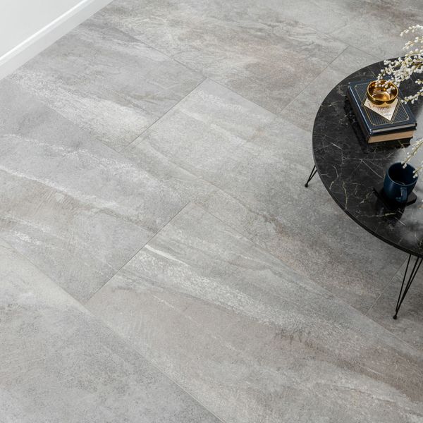 Astra grey matte stone-effect tiles, 1200x600mm, ideal for both floors and walls, crafted from porcelain, showcasing perfect grey tones.