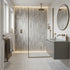 Modern bathroom with shower, sink, and mirror
