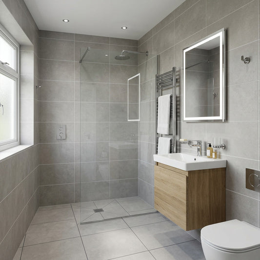 Modern bathroom with gray tiled walls, wooden vanity, and white fixtures.