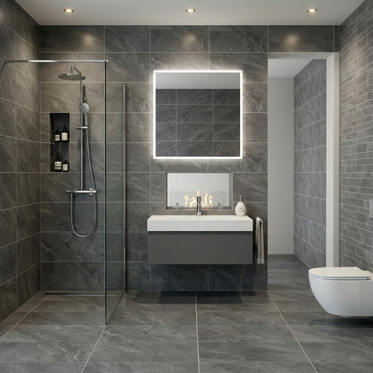 Modern bathroom with gray tiles, a shower, sink, and toilet.