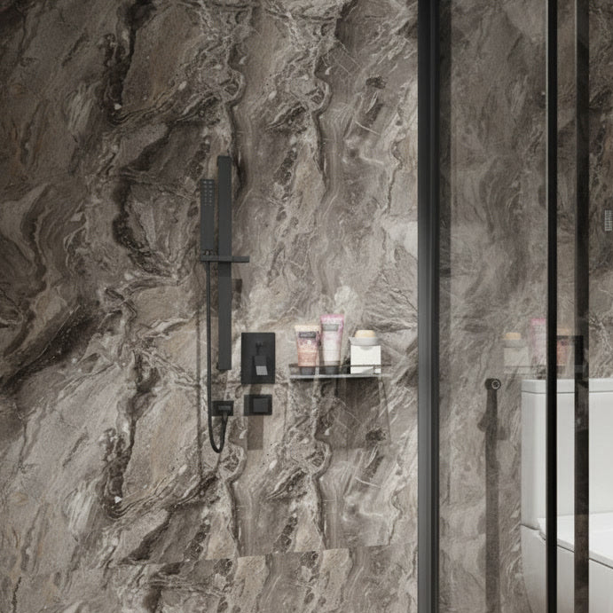 Bathroom with marble walls and toiletries on a shelf