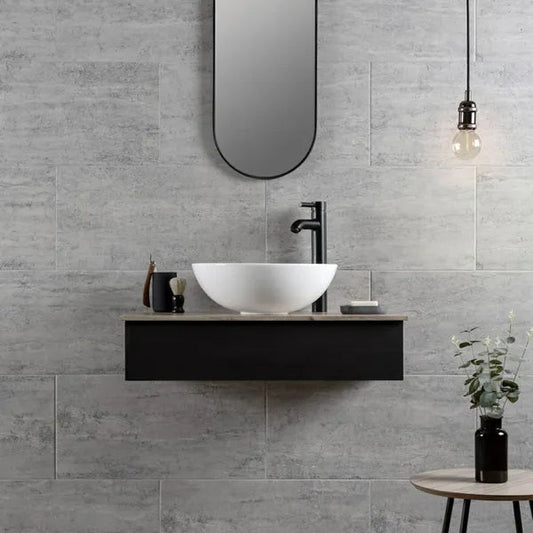Atrium Marte Grafito tiles, 300x600mm, suitable for floors and walls, made of porcelain with a stylish grey finish.